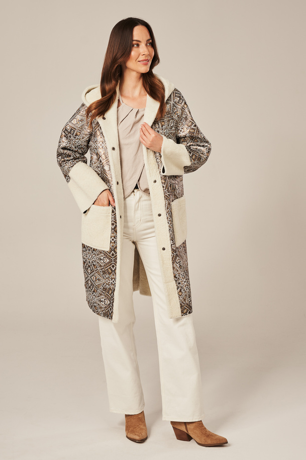 Moteriškas avikailio paltas